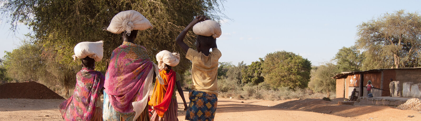 proposition_charity_not-for-profit.jpg Image of family carrying food
